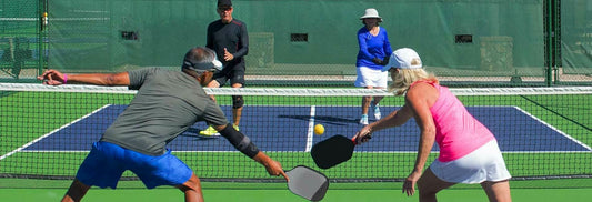 Older adults playing pickleball for all