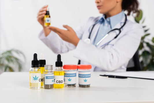 Bottles of CBD being studied by doctor for ECS research