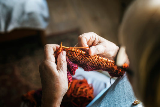 Senior woman knitting for hobby