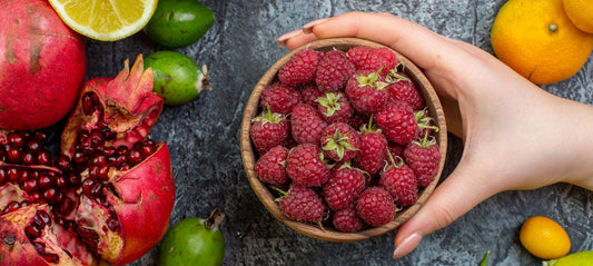 top view of fruit in bowl and on counter